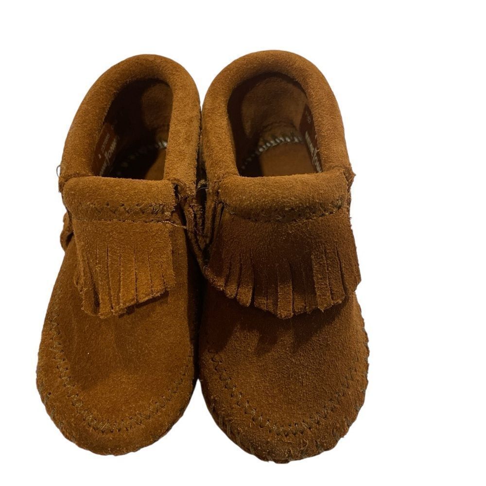 Minnetonka Tan  Moccasins with Fringe size 4